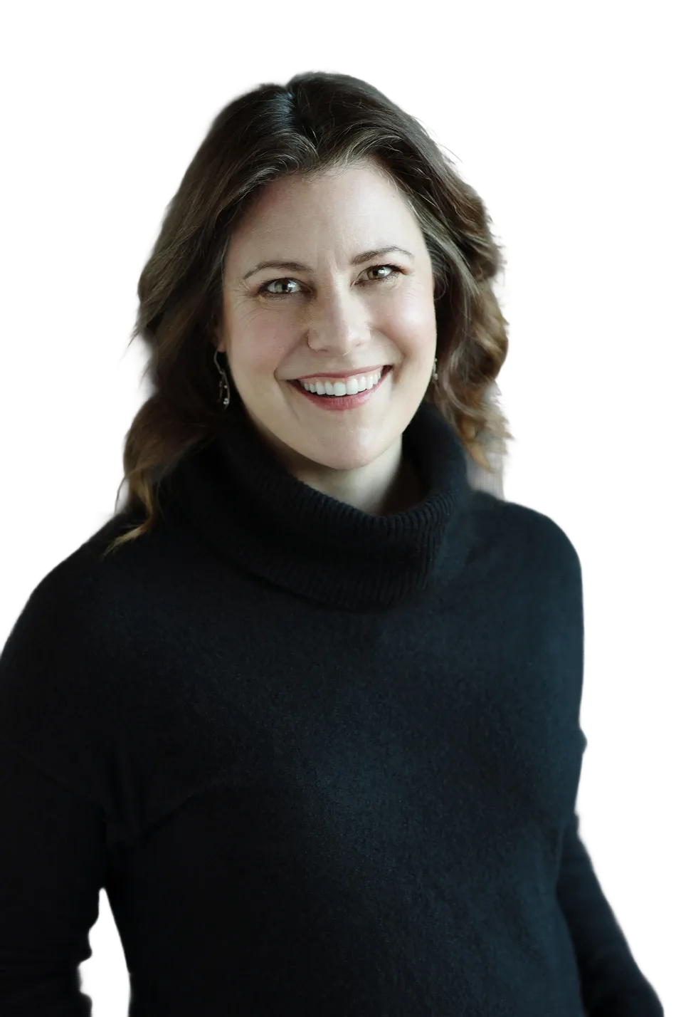 Studio portrait of a smiling woman against a dark background
